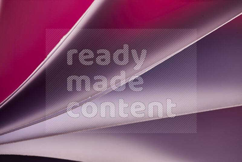 An abstract art piece displaying smooth curves in warm and cold gradients created by colored light