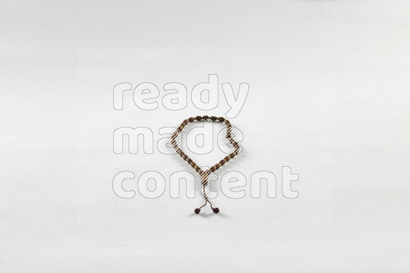 Prayer beads on white background