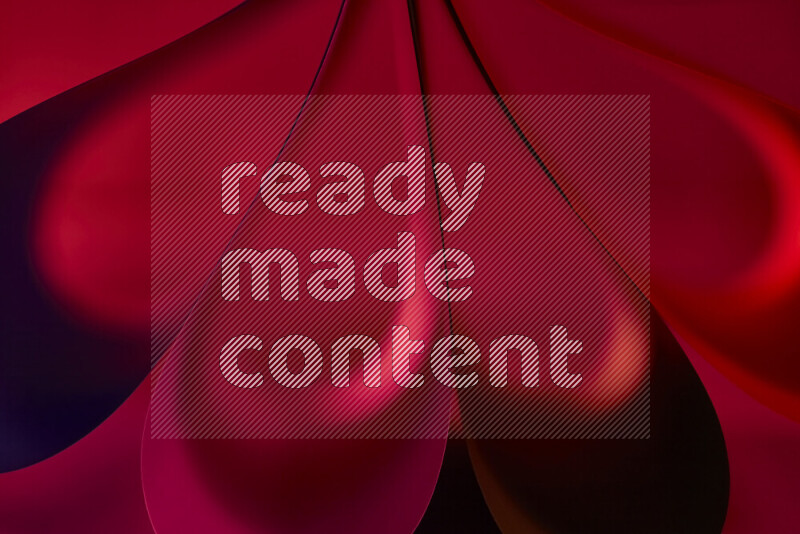 An abstract art piece displaying smooth curves in warm and cold gradients created by colored light