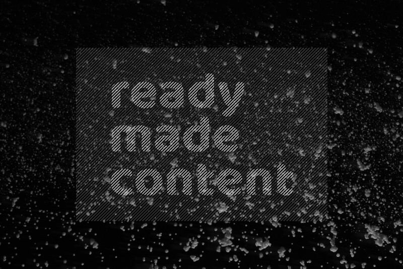 Snow spray on black background