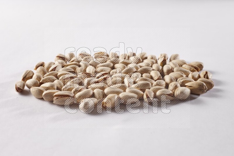 Pistachios on white background