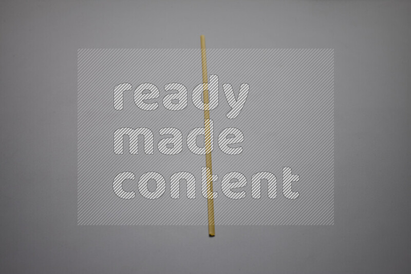 Linguini pasta on grey background