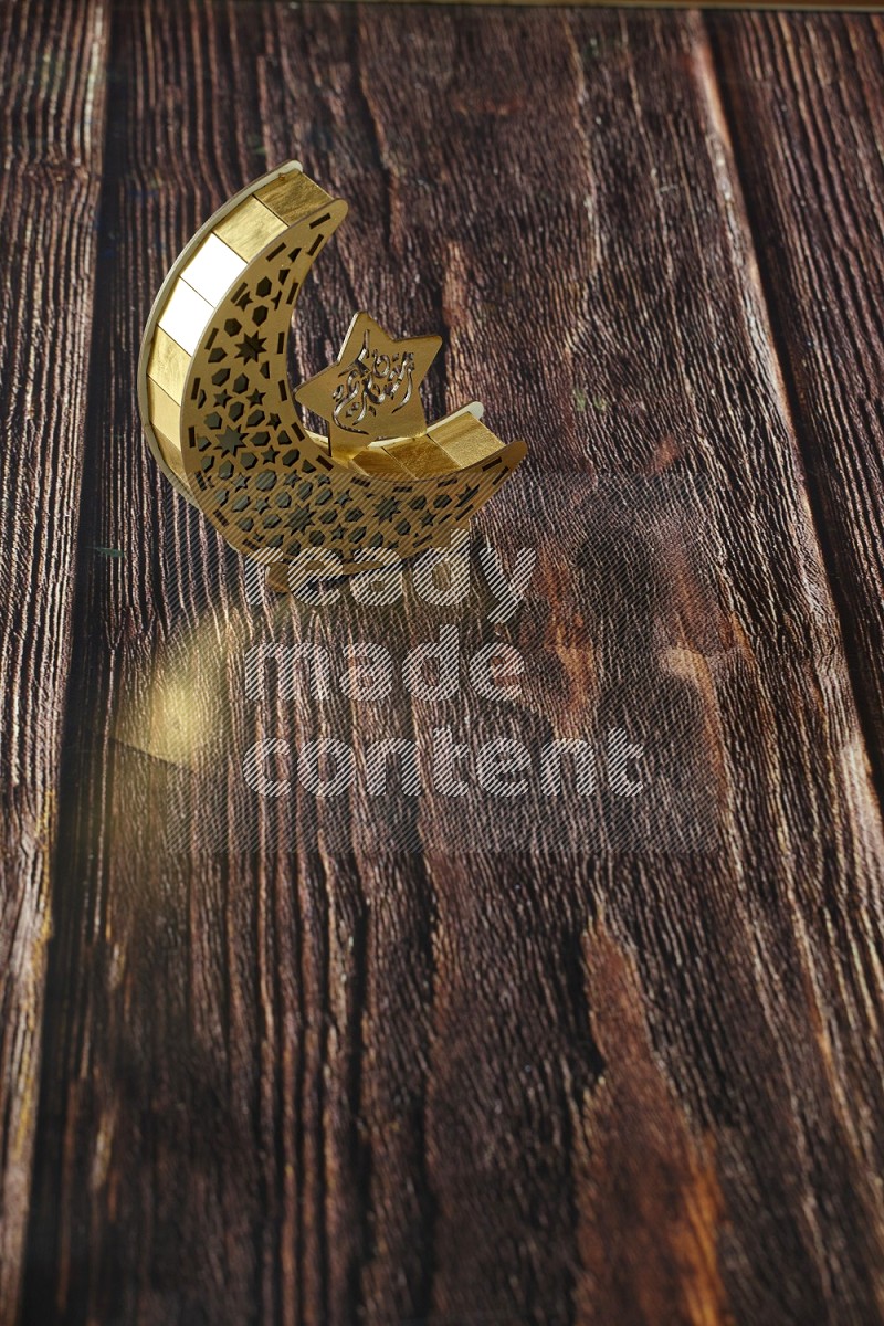 A lantern placed on a wooden background