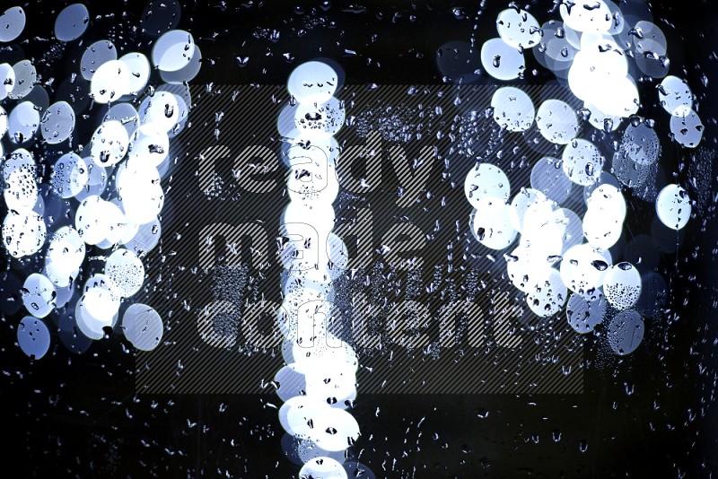 Bokeh light in white with water drops