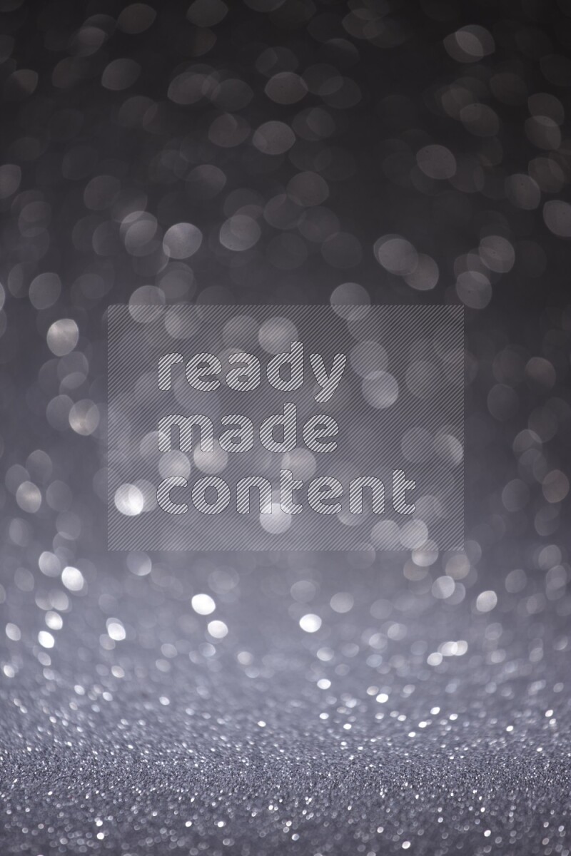 Black glittery bokeh background