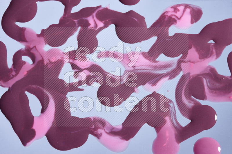 خلفية ملونة مع مزيج من ألوان الطلاء الأرجواني والوردي