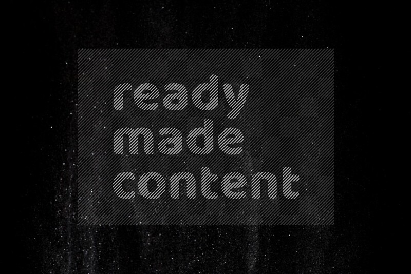 Silver glitter powder isolated on black background