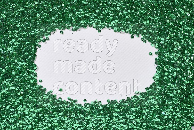 Multicolored flat sequins on grey background