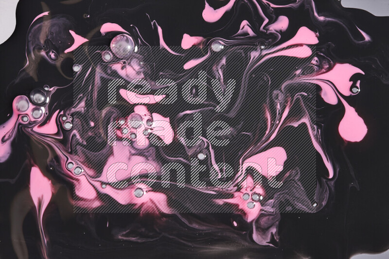 خلفية ملونة مع مزيج من ألوان الطلاء الوردي والاسود