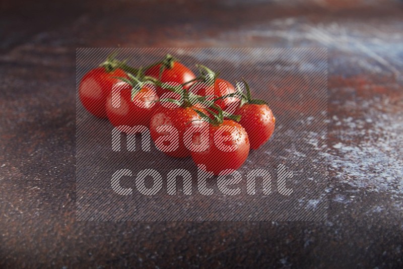 red cherry tomato vein on a reddish rustic metal background 45 degree