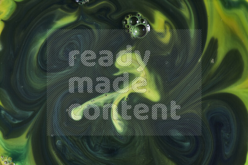 A close-up of abstract swirling patterns in green gradients