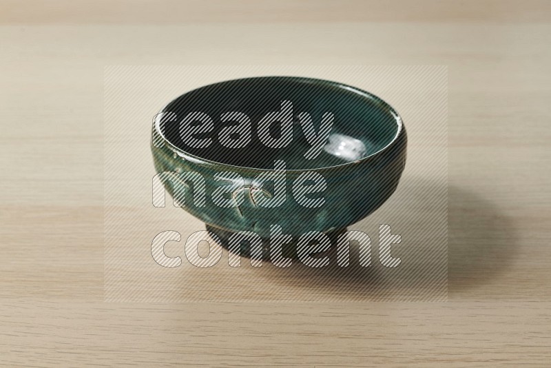 Dark Green Pottery Bowl on Oak Wooden Flooring, 15 degrees