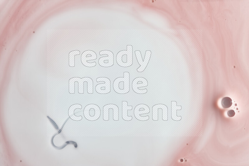 A close-up of abstract swirling patterns in red and white