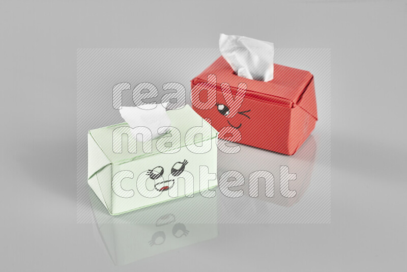 Origami tissue box on grey background