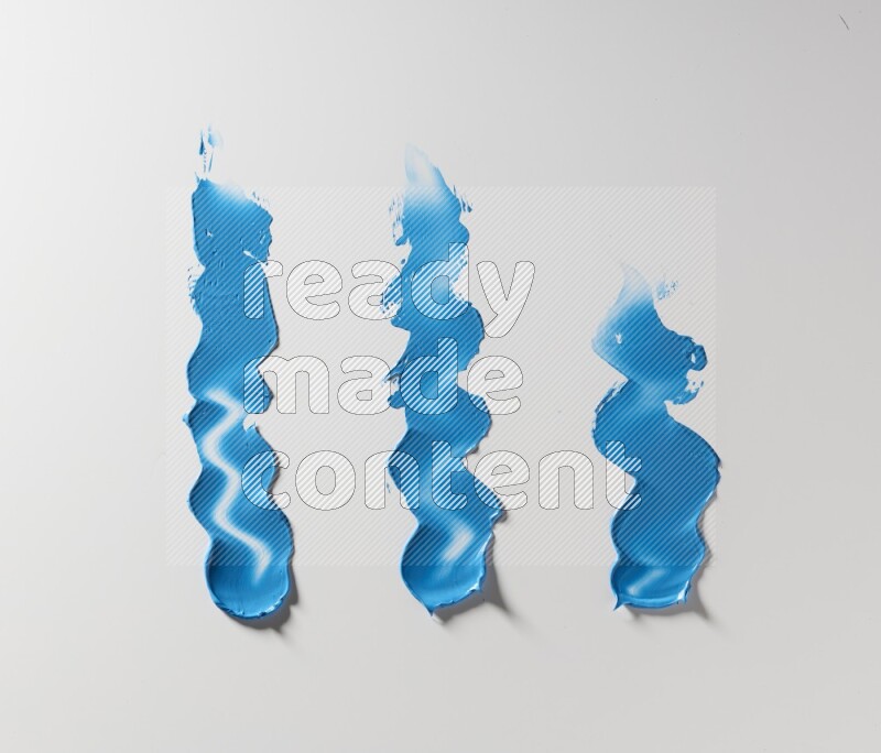 Blue zigzag painting knife strokes on white background
