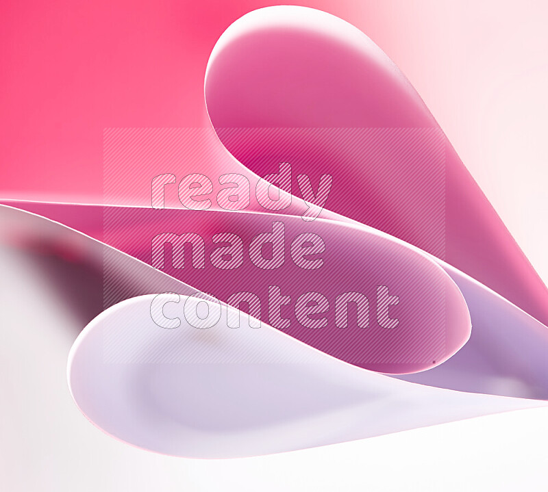 An abstract art of paper folded into smooth curves in white and pink gradients