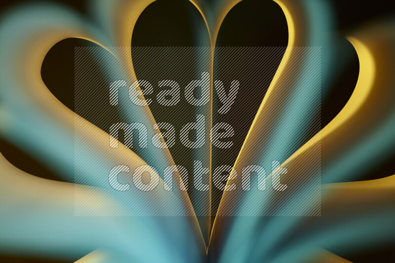 فن تجريدي يعرض منحنيات وتدرجات اللون الأصفر والأخضر مكونه بضوء ملون