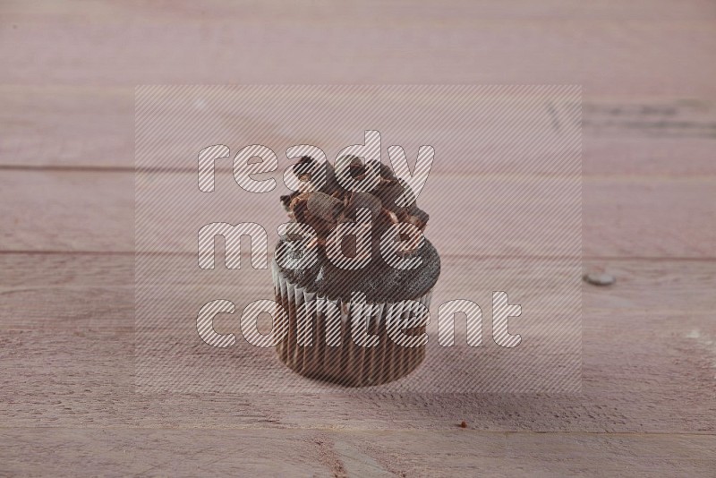 Chocolate mini cupcake topped with chocolate curls