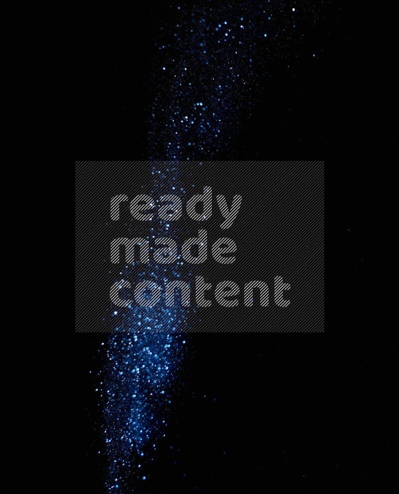 Blue glitter powder isolated on black background