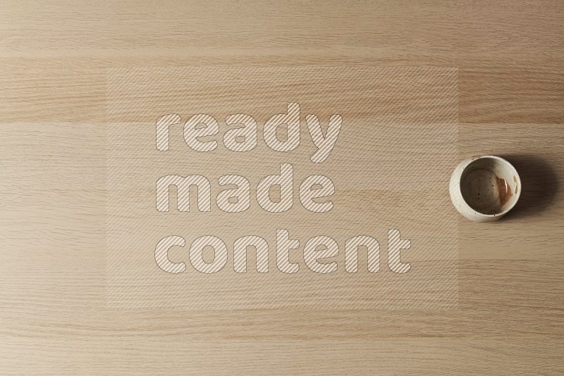 Top View Shot Of A Pottery Cup on Oak Wooden Flooring