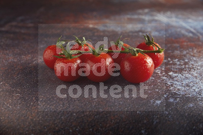 red cherry tomato vein on a reddish rustic metal background 45 degree