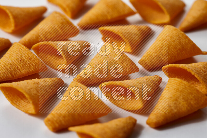 Assorted snacks on white background