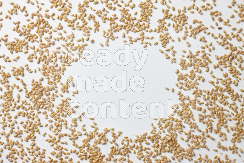 Hulled wheat on white background