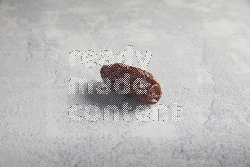 one madjoul date on a light grey background