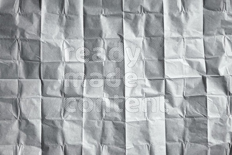 White paper sheet on black background