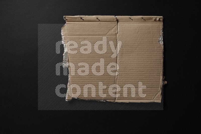 Cardboard on black background