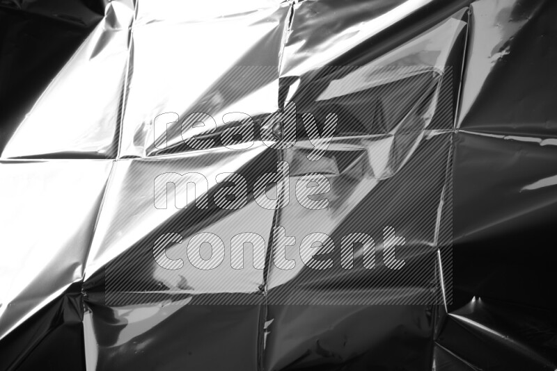 Plastic wrap texture on black background