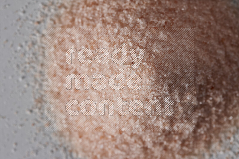 A bunch of fine himalayan salt on white background