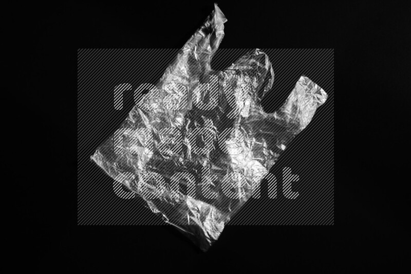 Transparent plastic textures on black background