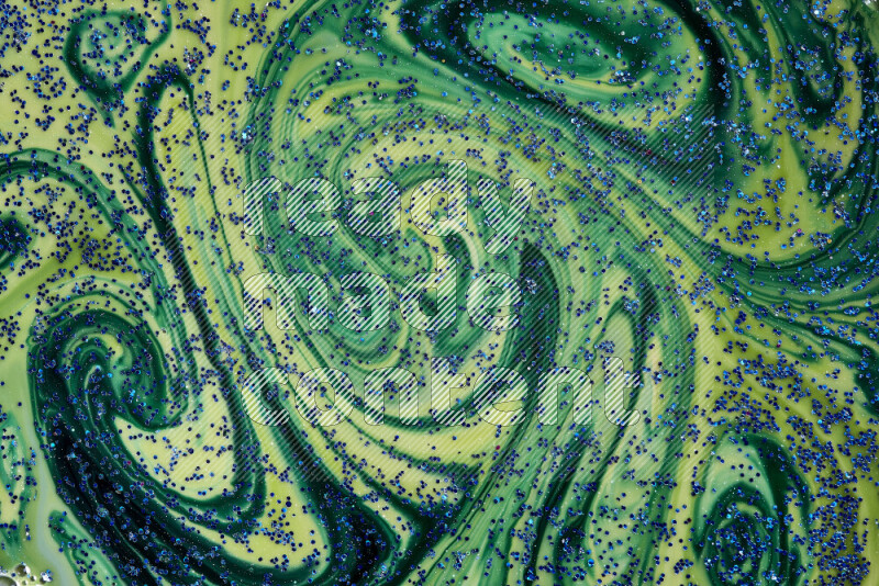 لقطة مقربة لبريق أزرق متلألئ منتشر على خلفية من اللون الأزرق والأخضر في حركات دائرية