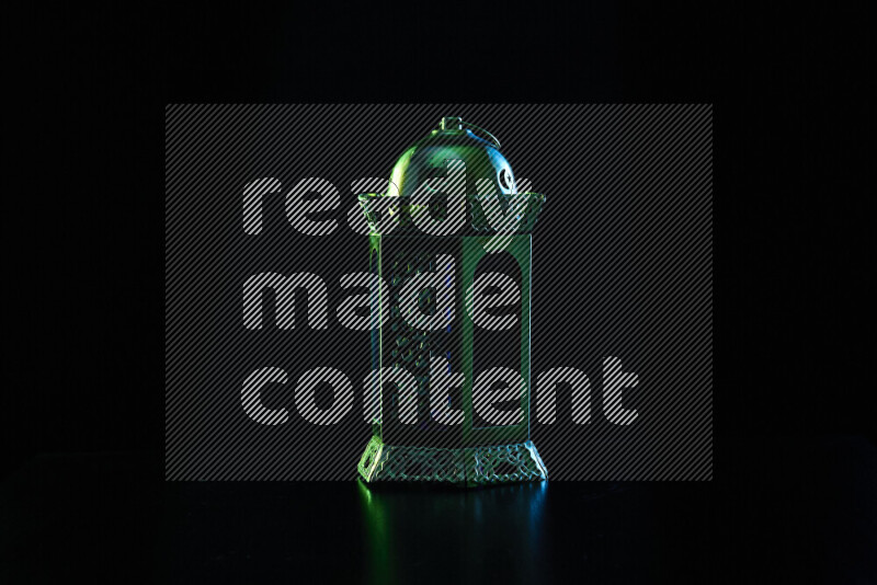 Ramadan lanterns with colored rim light against black background