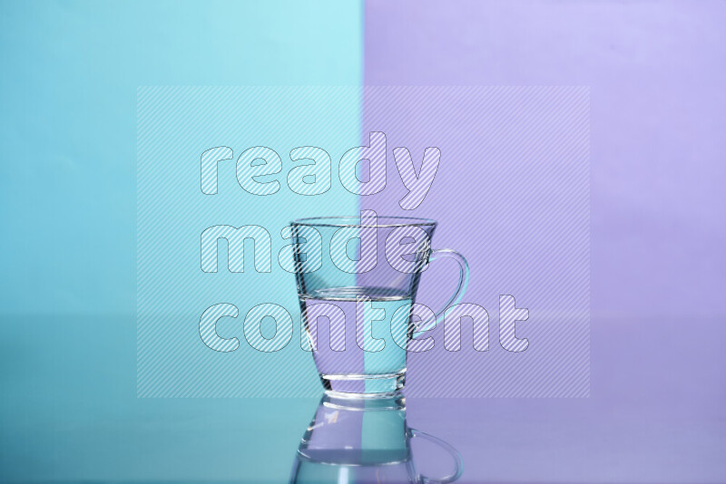 The image features a clear glassware filled with water, set against light blue and light purple background