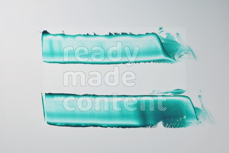 Turquoise painting knife strokes on white background