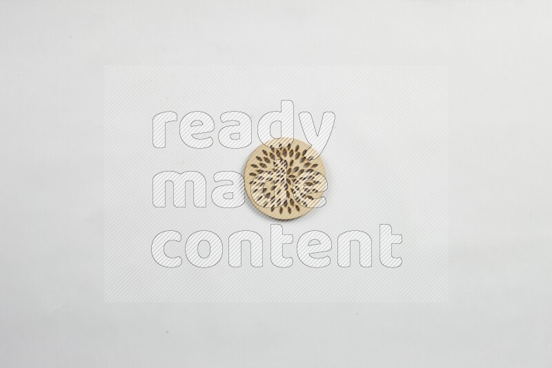 Crafted wooden coasters on white background