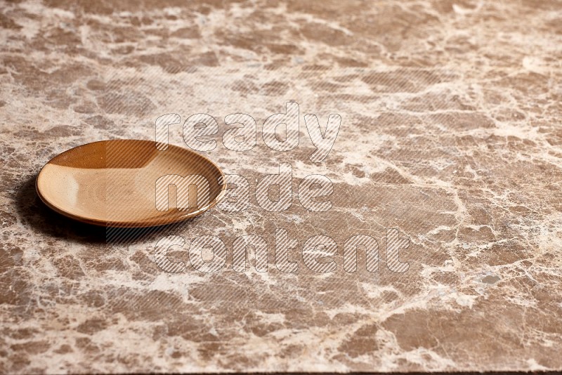 Multicolored Pottery Plate on Beige Marble Flooring, 45 degrees