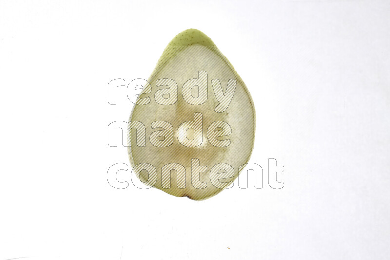 Pear slices on illuminated white background