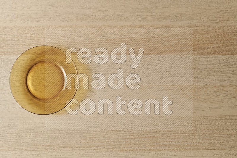 Top View Shot Of A Circular Glass Plate on Oak Wooden Flooring