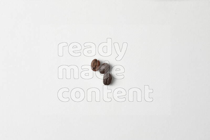 Roasted coffee beans on white background