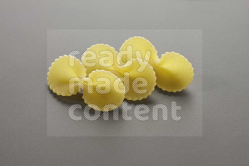 Fiocchi pasta on grey background