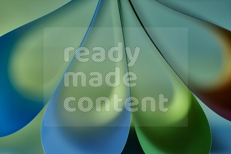 An abstract art piece displaying smooth curves in colorful gradients created by colored light