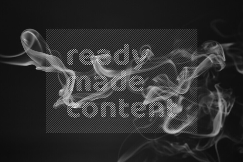 Motion of wavy smoke isolated on dark background