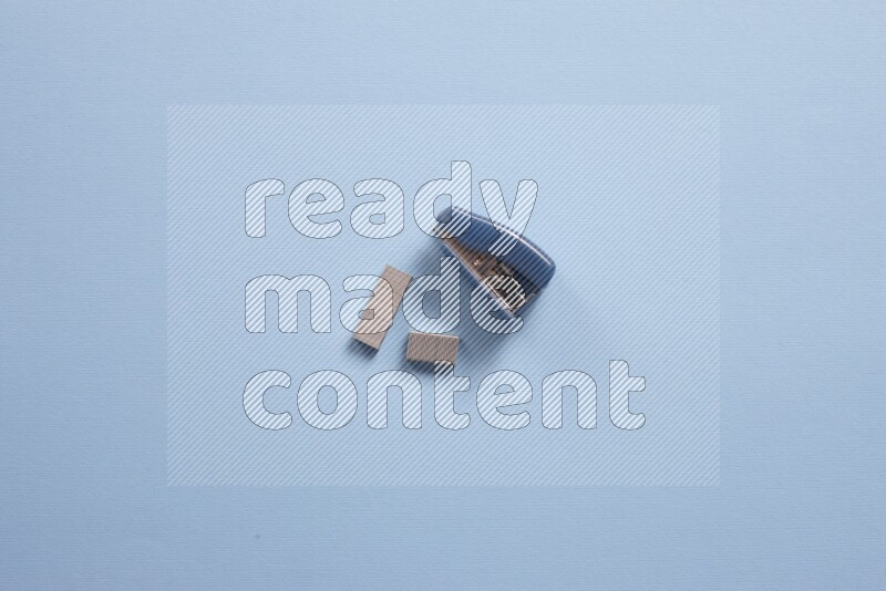 Different school supplies on blue background