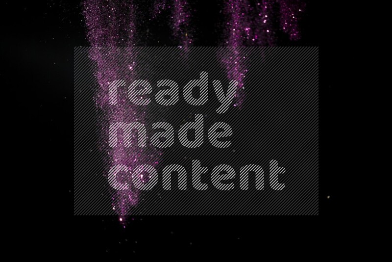 Pink glitter powder isolated on black background