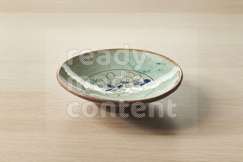 Decorative Pottery Plate on Oak Wooden Flooring, 15 degrees