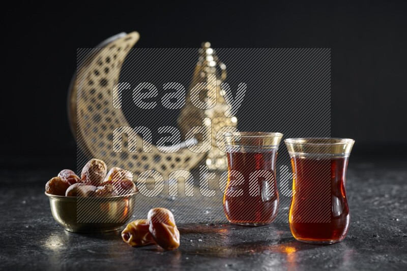 Dates with hot drinks and golden lanterns in a dark setup