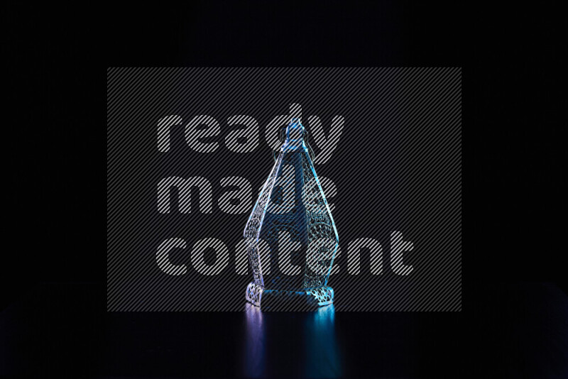 Ramadan lanterns with colored rim light against black background